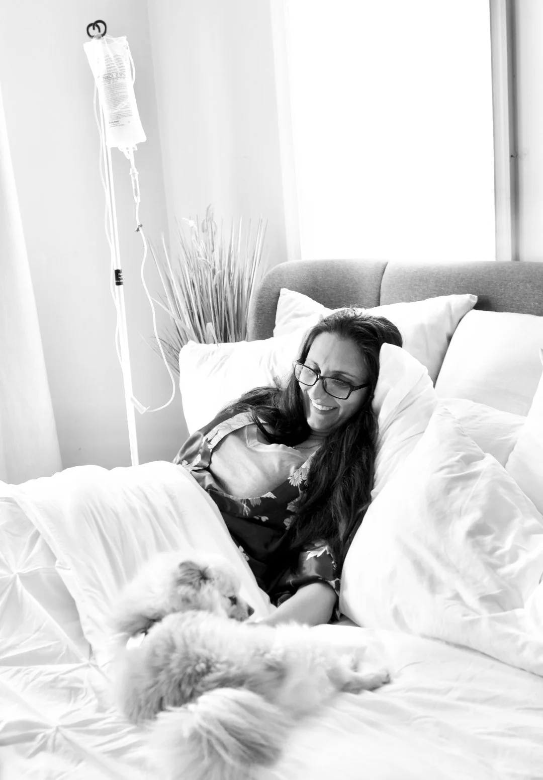 A client resting comfortably at home during an infusion